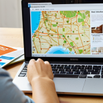 **

*   **Prompt:** A person happily working from home, possibly on a laptop, with travel brochures or maps visible in the background. The overall mood should be aspirational and convey financial freedom. Focus on visual elements suggesting savings, investments, and a comfortable lifestyle.

**